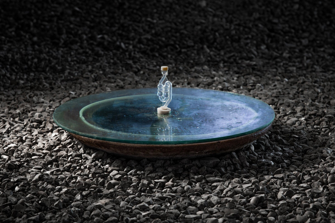 A qvevri set into the gravel floor of the marani at Periani